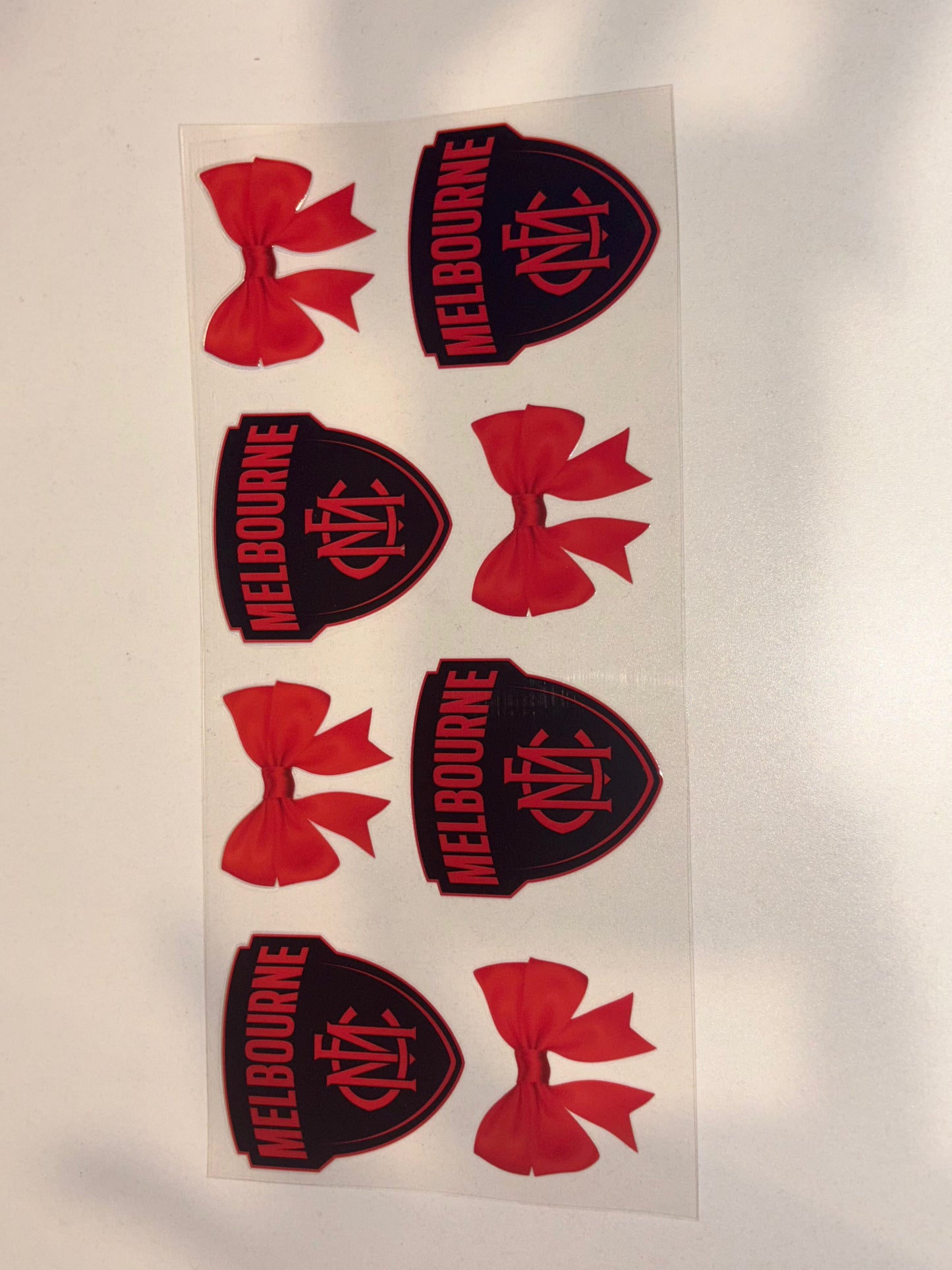 AFL logos and bows